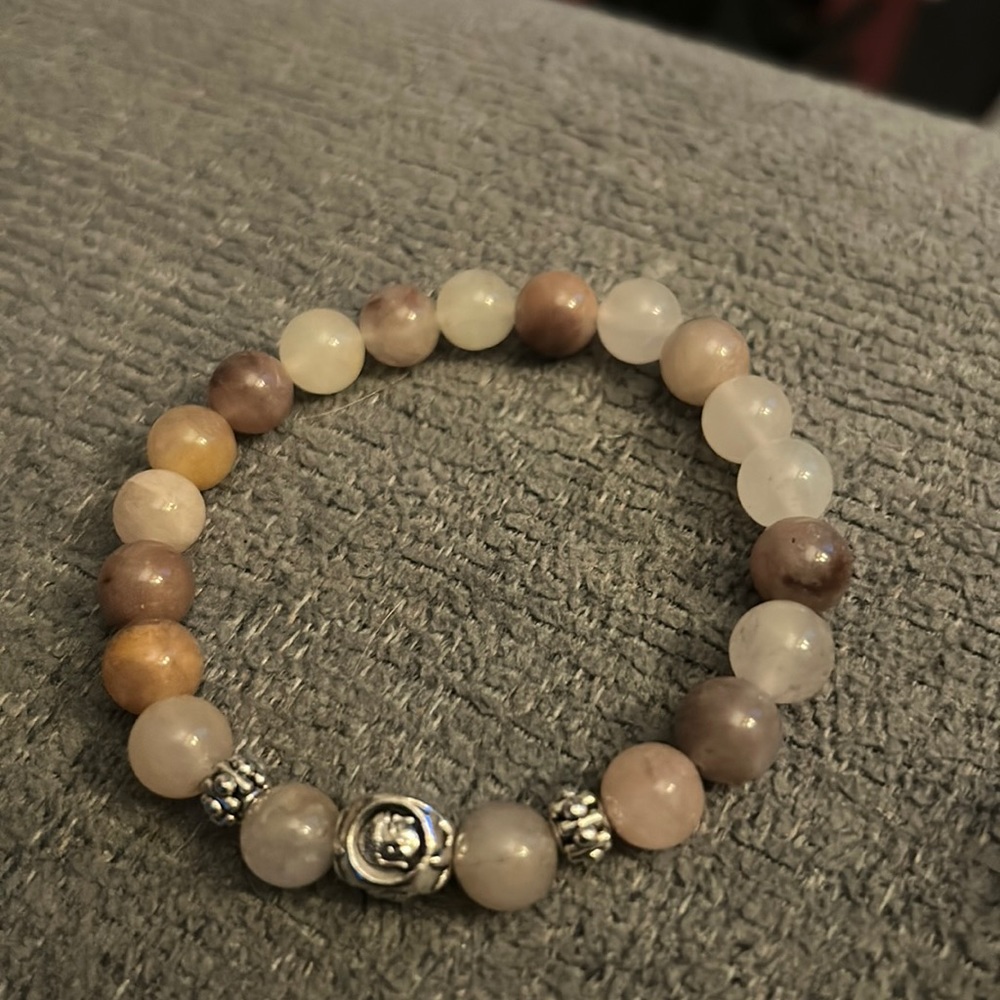 Violet quartz bracelet with buddha charm